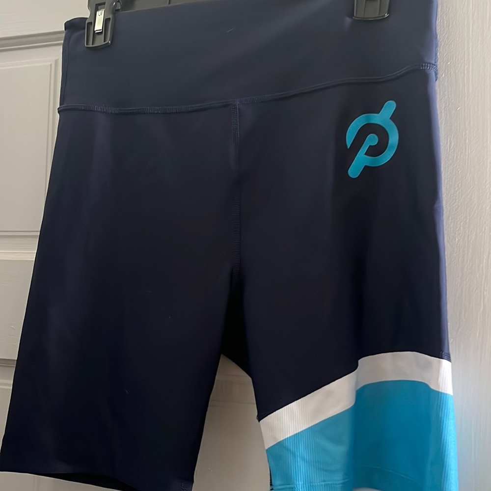 Like new. Worn once or twice. Washed and hung dry.